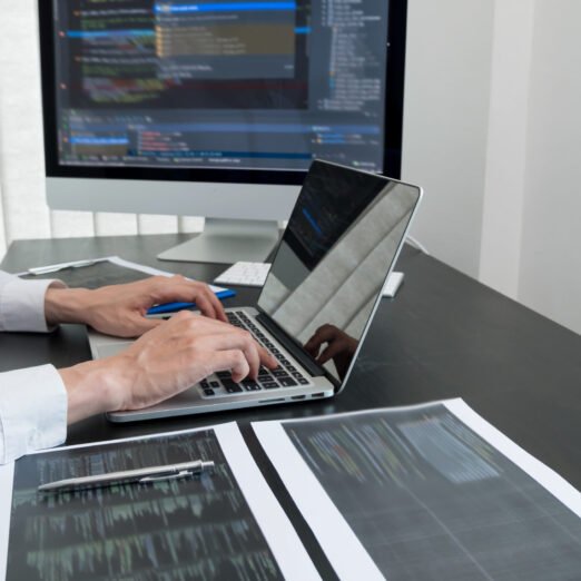 Programmer, Man working with computer programming, professional development, and coding technology, working on high-quality visual software development websites.